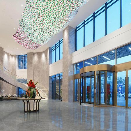 Park Inn By Radisson Nanchong Yilong Star City Plaza Bagian luar foto
