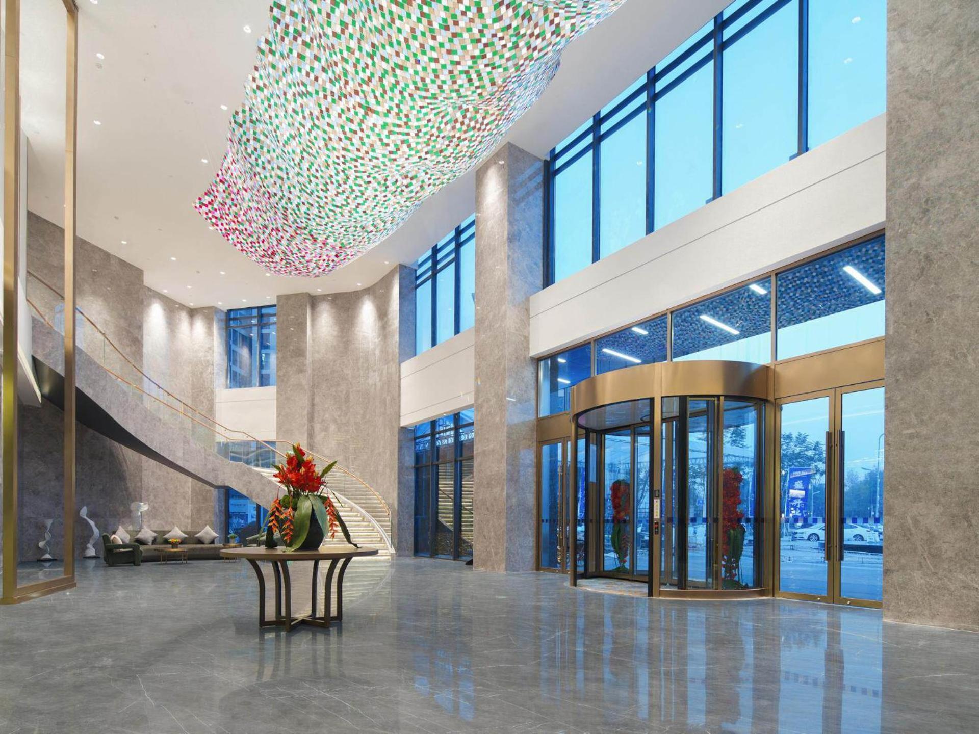 Park Inn By Radisson Nanchong Yilong Star City Plaza Bagian luar foto