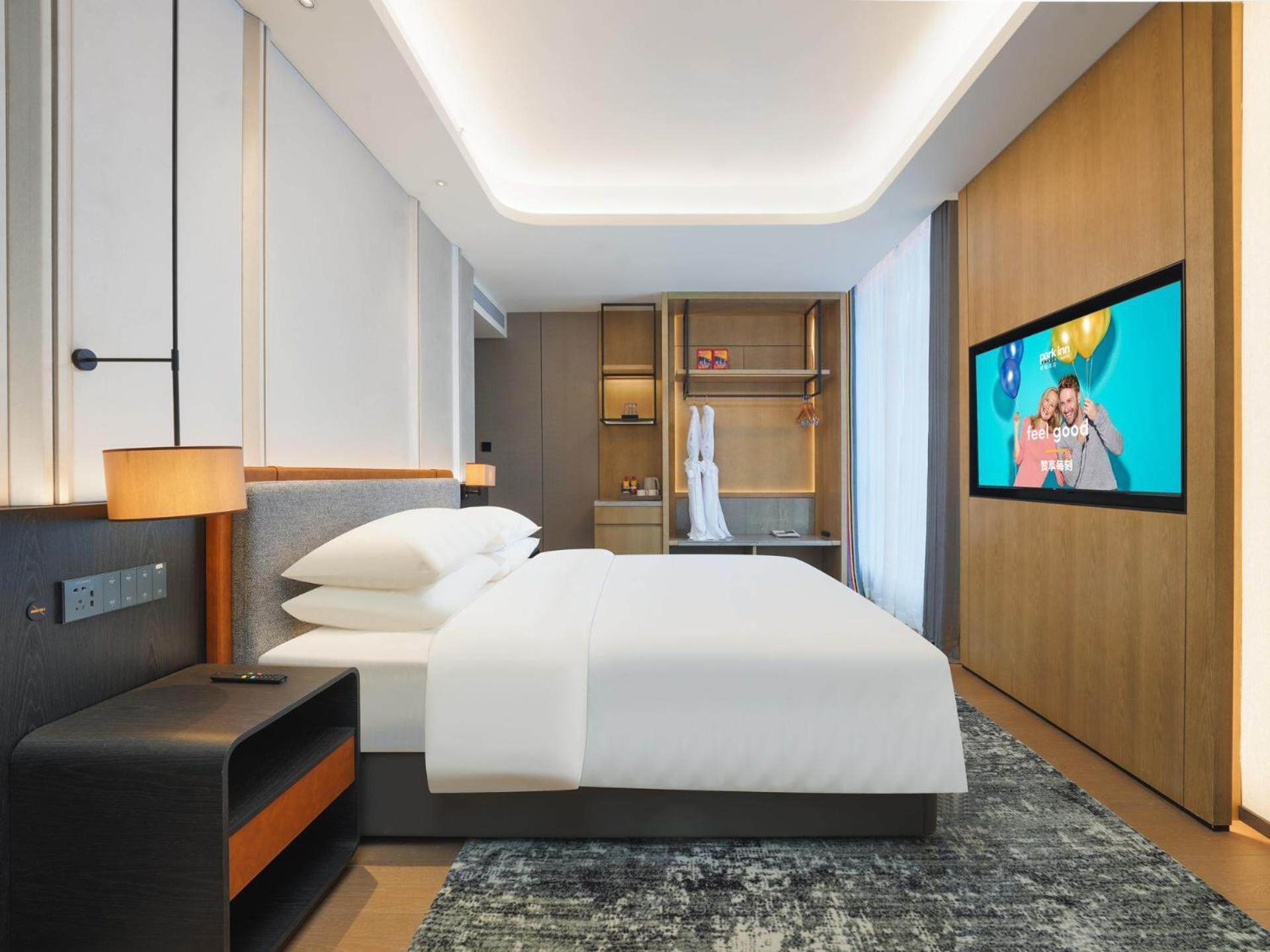 Park Inn By Radisson Nanchong Yilong Star City Plaza Bagian luar foto