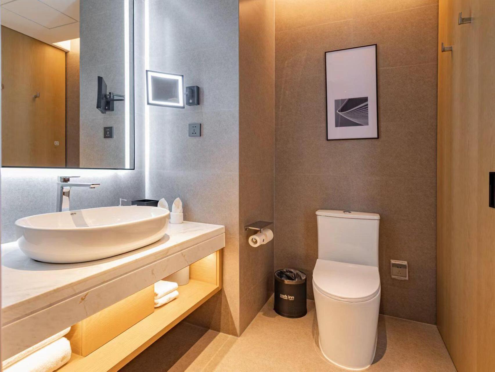 Park Inn By Radisson Nanchong Yilong Star City Plaza Bagian luar foto