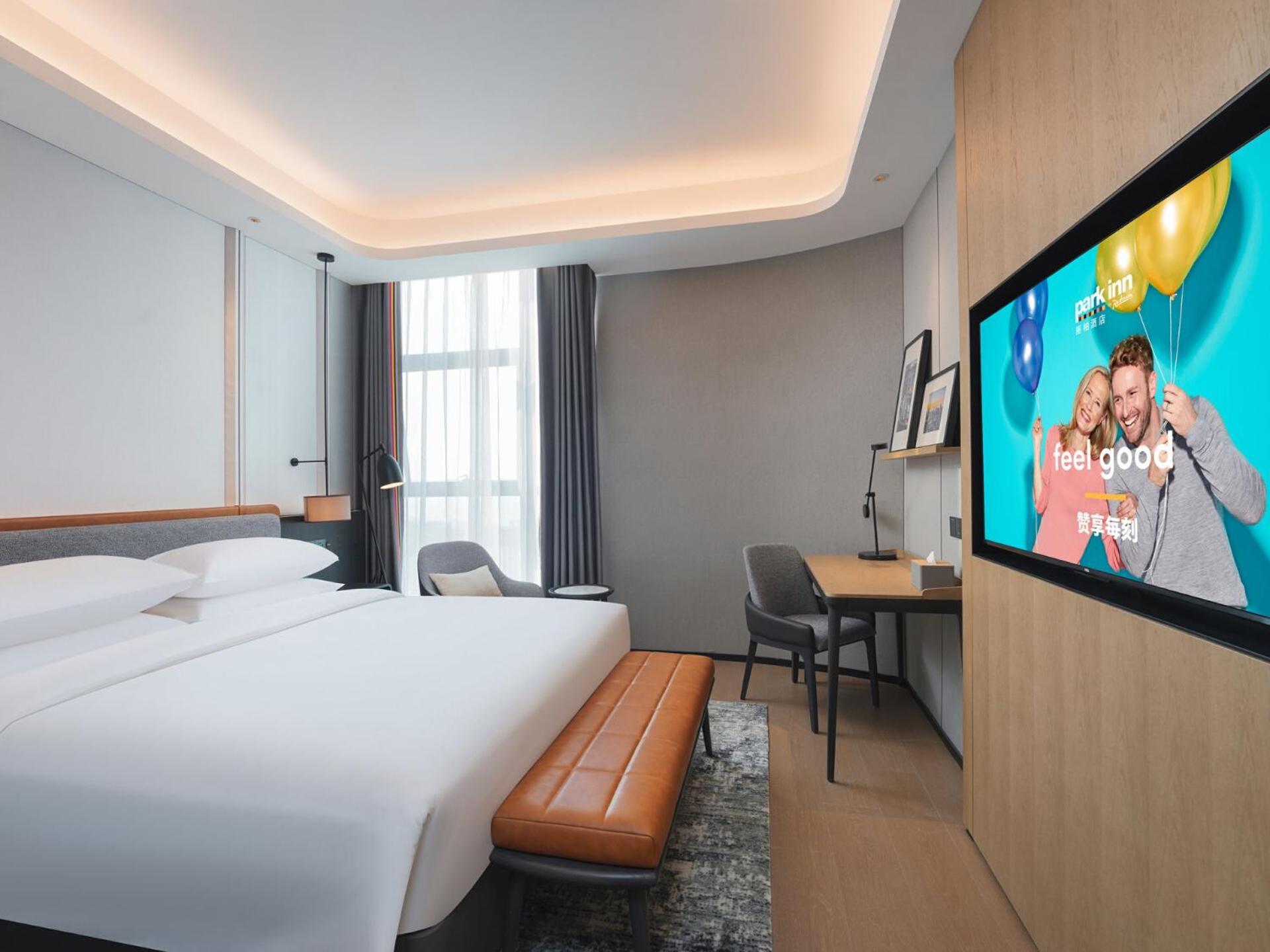 Park Inn By Radisson Nanchong Yilong Star City Plaza Bagian luar foto