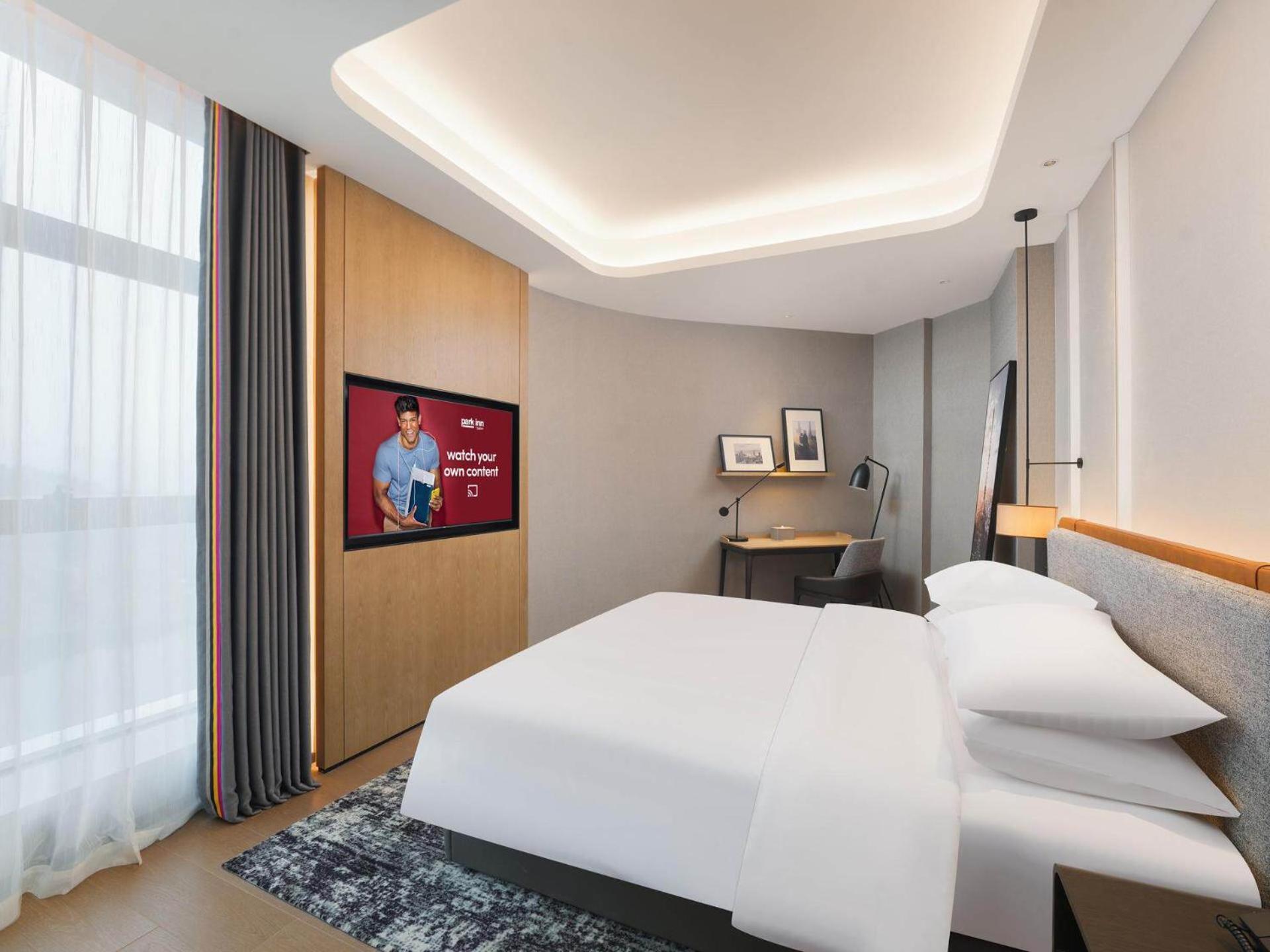 Park Inn By Radisson Nanchong Yilong Star City Plaza Bagian luar foto