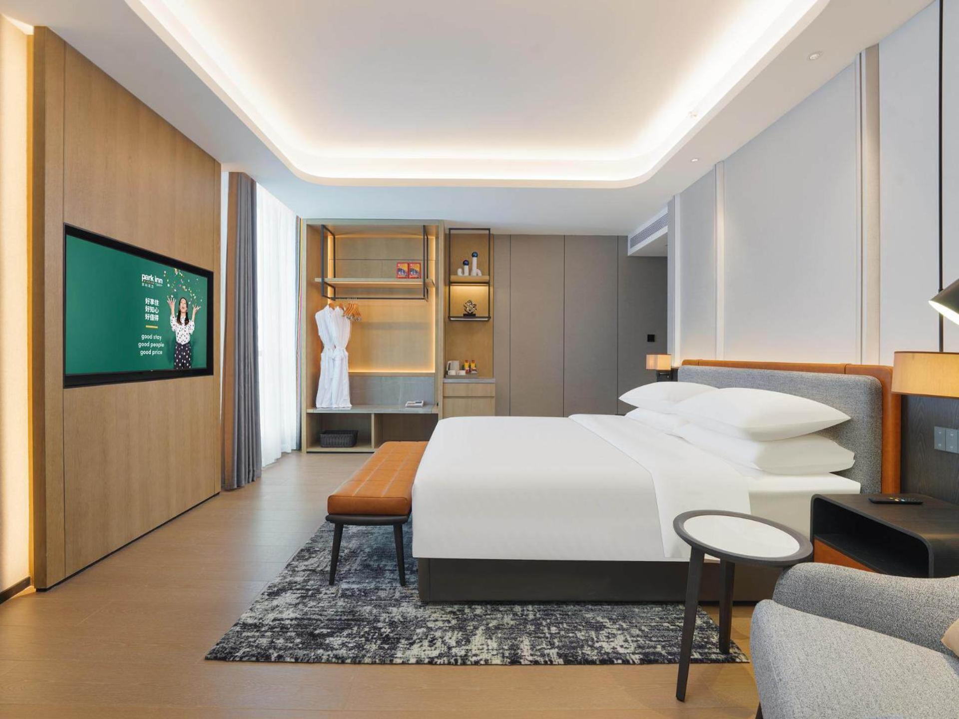 Park Inn By Radisson Nanchong Yilong Star City Plaza Bagian luar foto