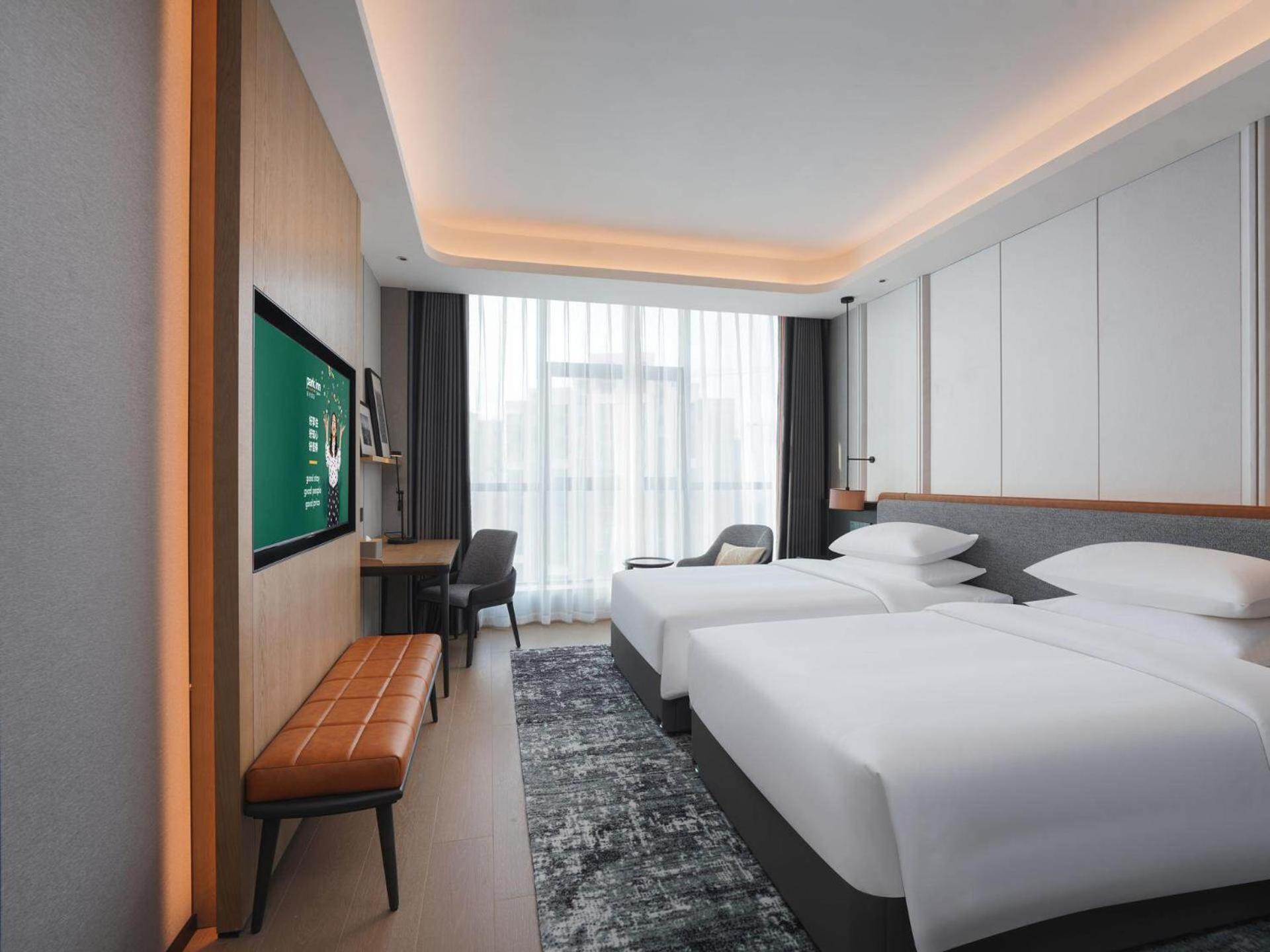 Park Inn By Radisson Nanchong Yilong Star City Plaza Bagian luar foto